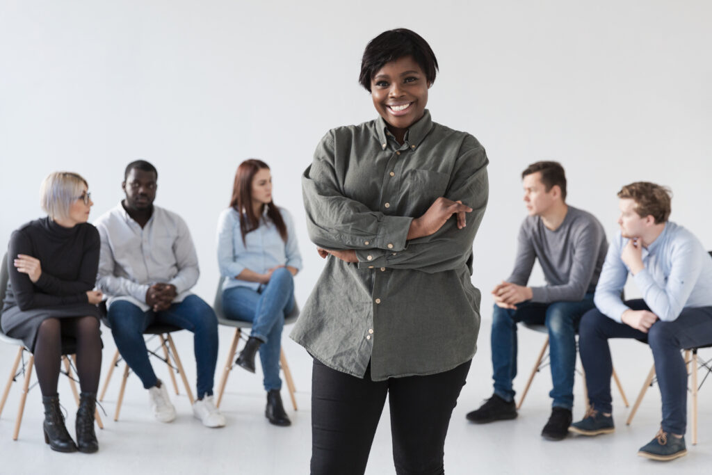 afro american female standing front rehab patients
