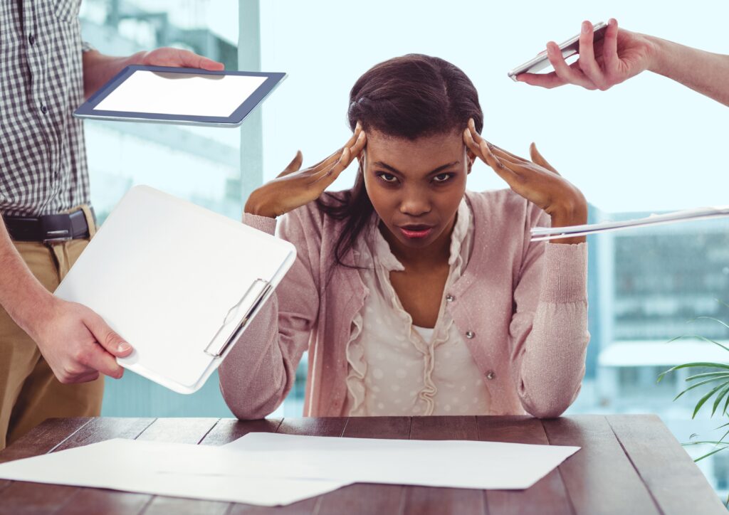 conceptual image of businesswoman frustrated due to work load