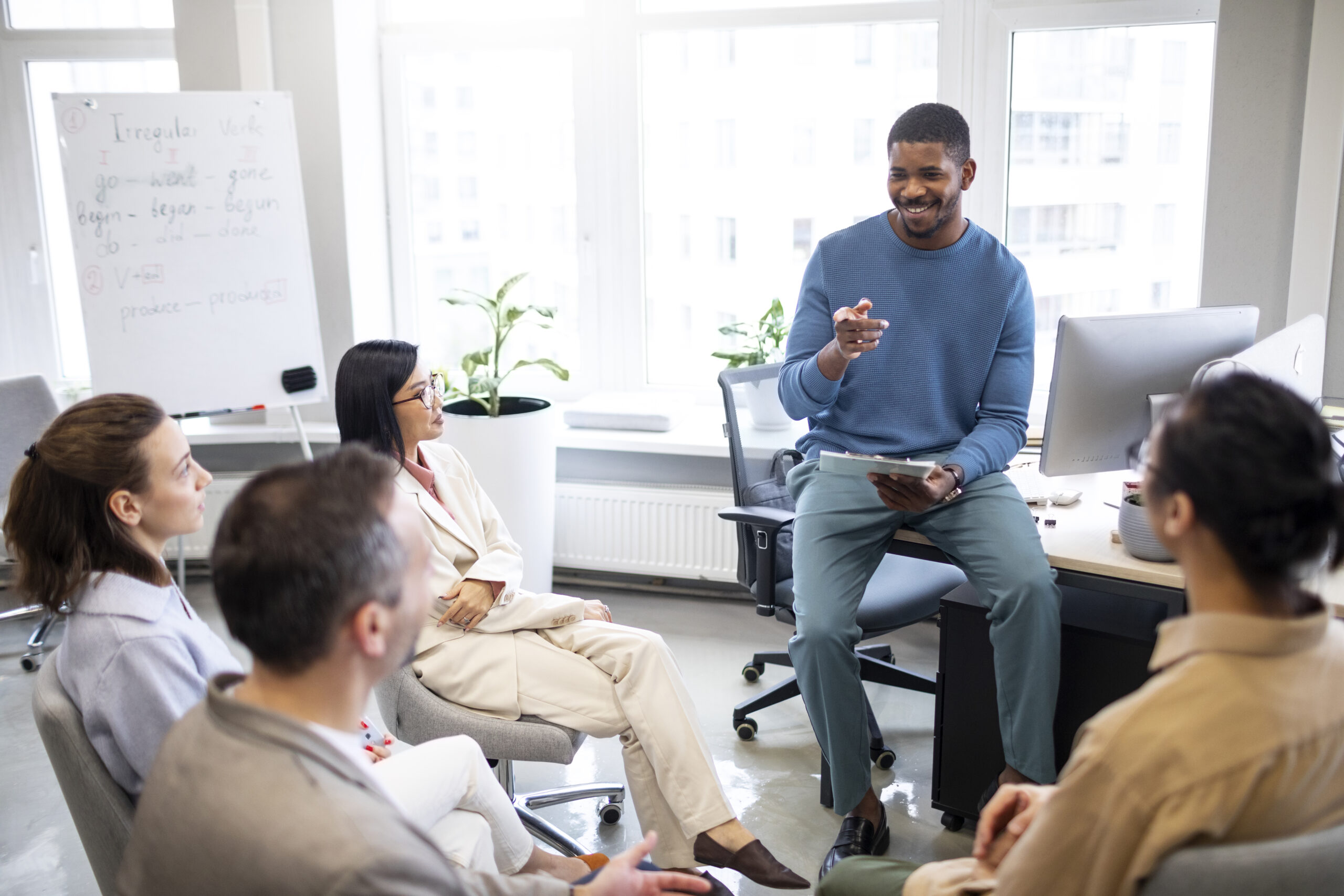 medium shot people learning office